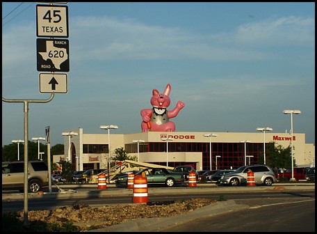 Easter Bunny on a Car Dealer Easter Bunny on a Car Dealer